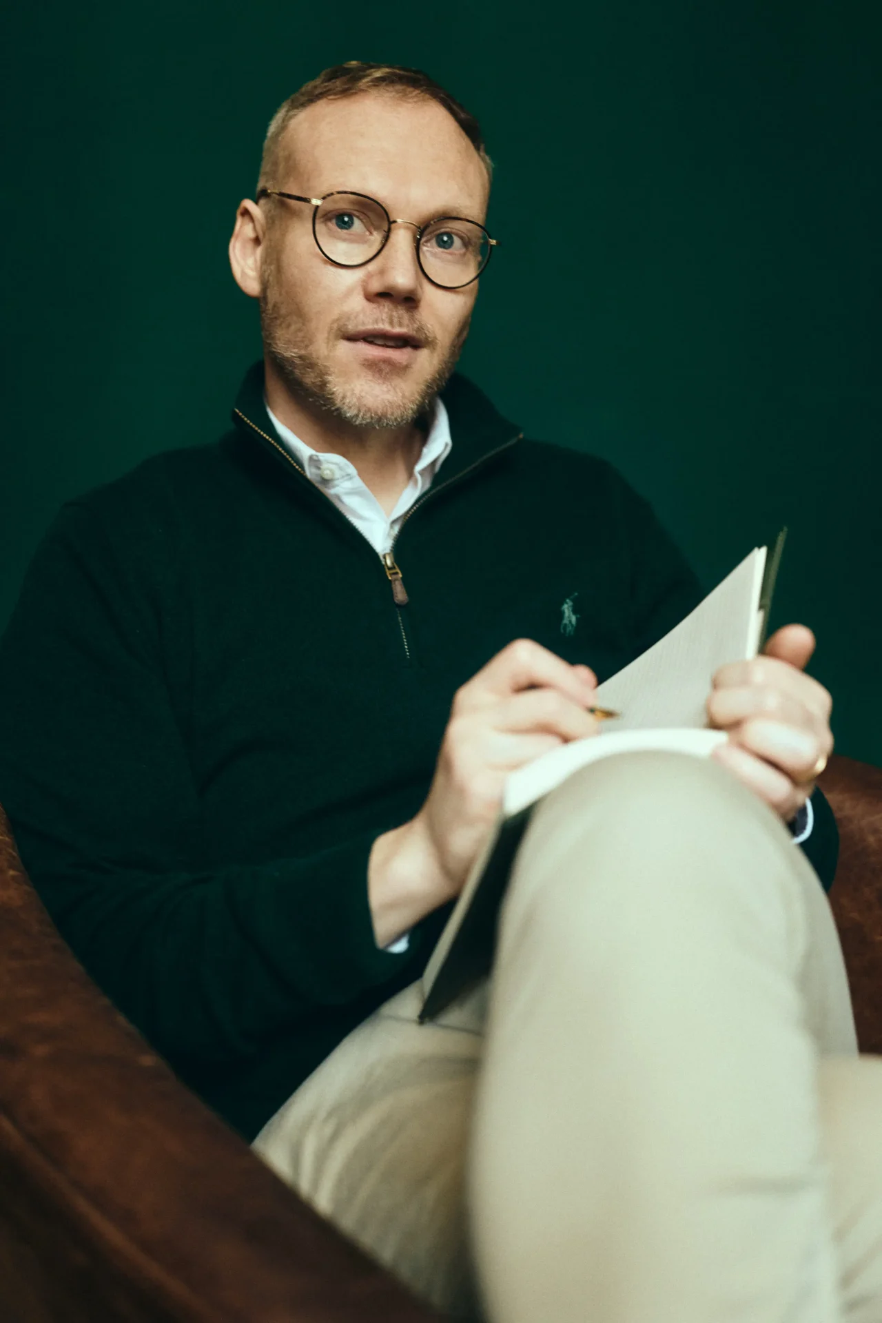 S2073 Professor Tommy taking notes during a counselling session.